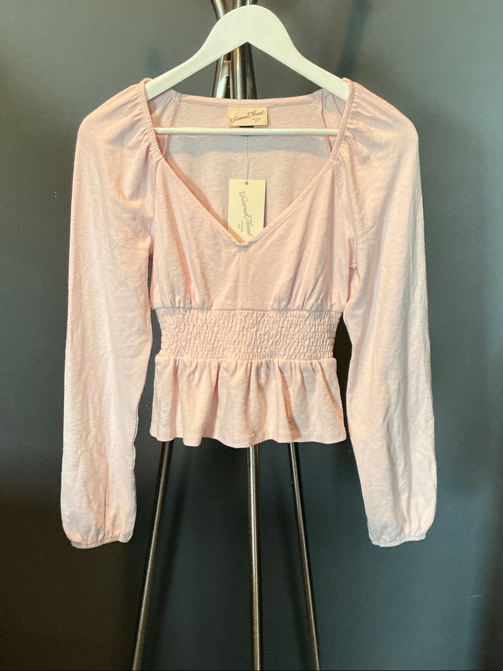 Light Pink Smocked Peplum Long-Sleeve Top